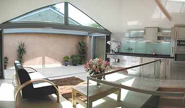 house Gibson Road Bristol, sustainable features include a  glazed thermal buffer space with sliding roof - local amenity society award